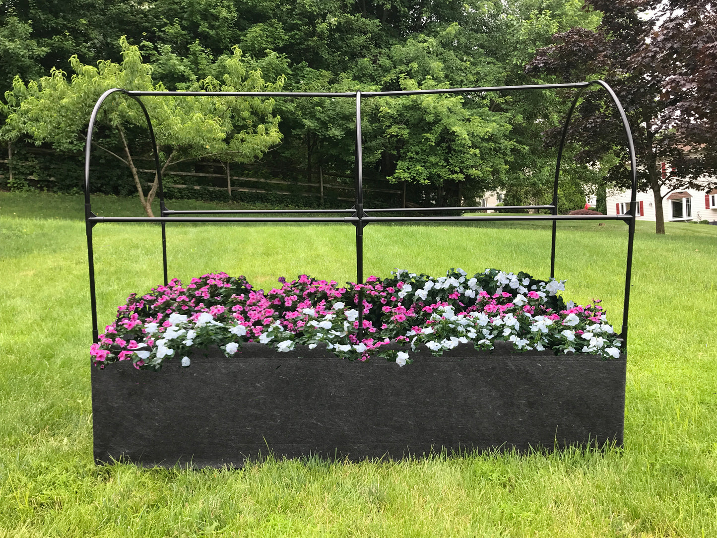 Raised fabric bed provides ideal environment for your vegetables and flowers.